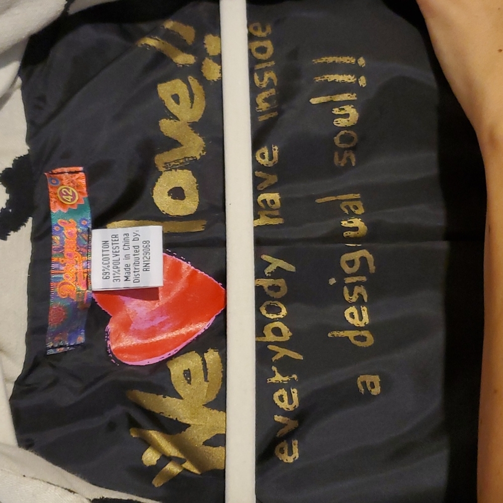 Classy, dress up or down. Med to Small Large fit.